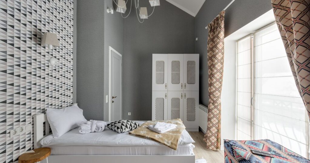 Prepared bedroom with fresh towels ready for the next Airbnb guest