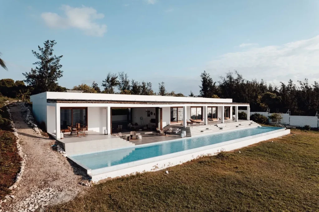 A villa with an infinity pool looking out over open countryside