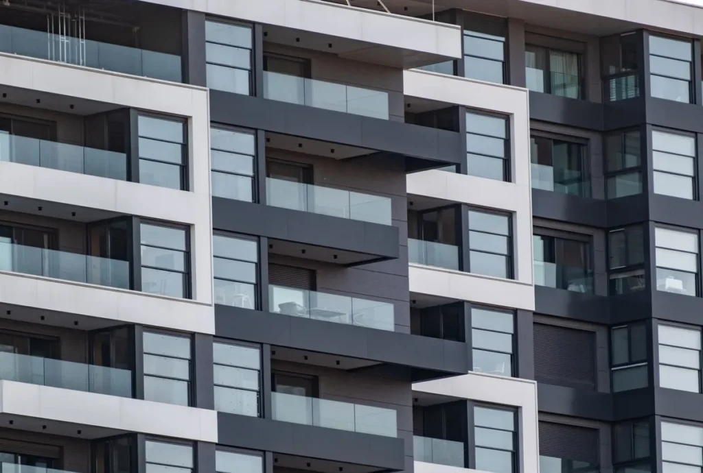 The facade of a modern apartment block, balcony above balcony