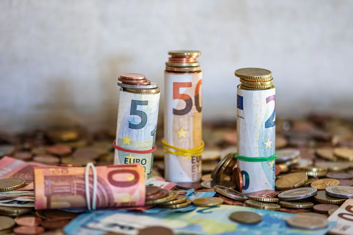 Banknotes rolled and held with an elastic band