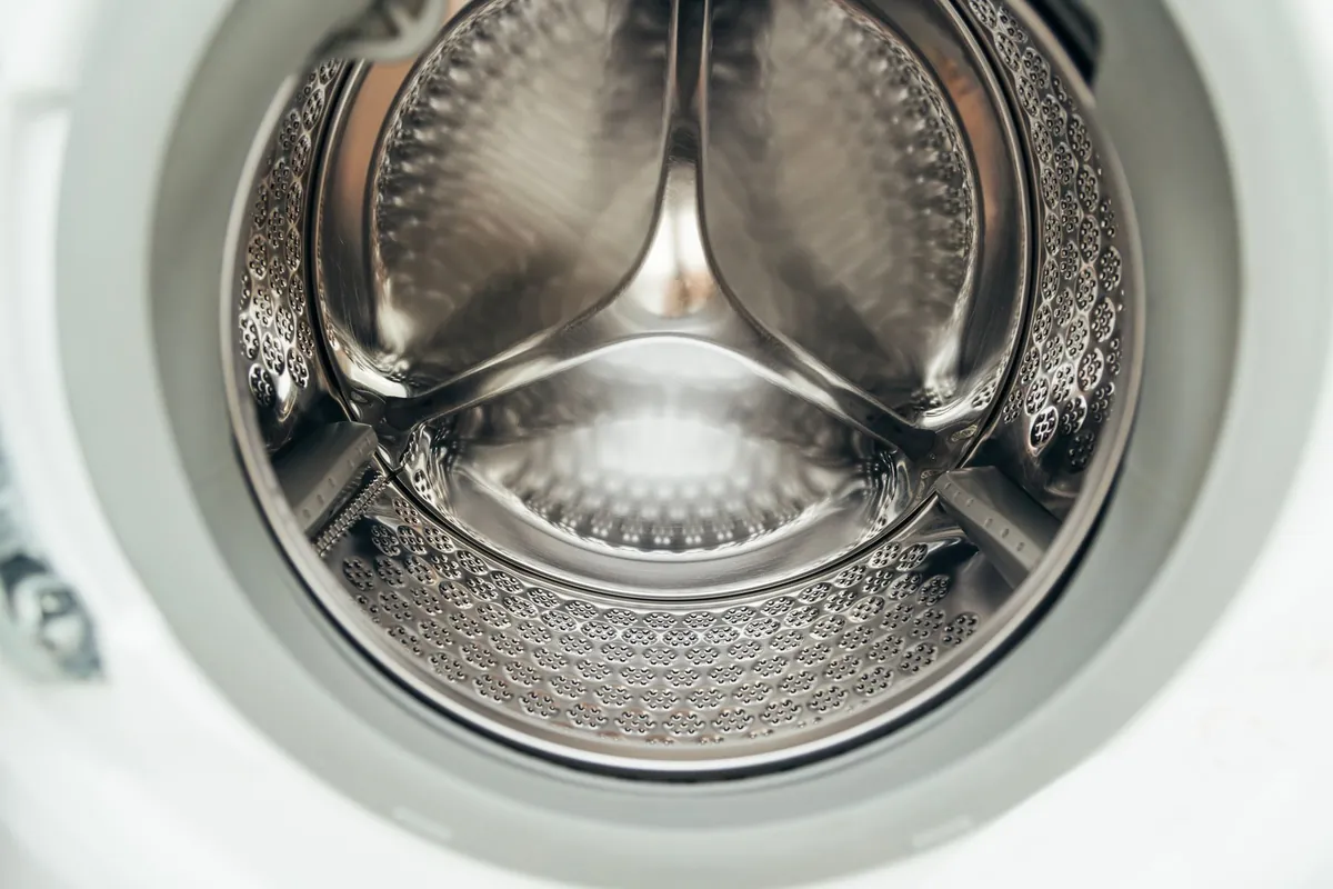 Interior of a clean modern front-loading washing machine drum