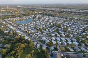 Aerial view of a residential community with houses and lakes in Florida