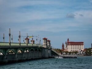 Bridge of Lions spanning the water with historic buildings in St. Augustine, Florida